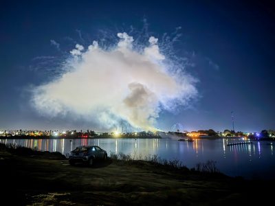 A cloud of fireworks smoke from one of 150 SeaWorld fireworks shows per year that pollute Mission Bay.